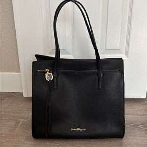 Salvatore Ferragamo Elegant Black Tote - “Amy”

Height 12 inch
Width 13 inch
